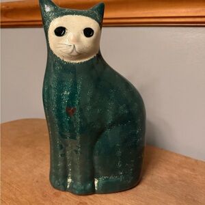 vintage or pottery cat figurine with a hand-painted sponge-painted finish.